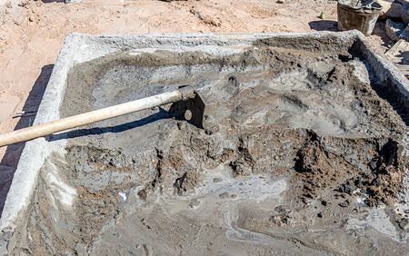 Cement mortar at a construction site in a troughの写真素材
