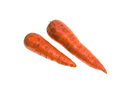 Carrot on a white background close-up. The concept of a healthy diet. Vegetarianism.の写真素材
