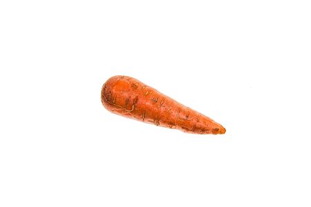 Carrot on a white background close-up. The concept of a healthy diet. Vegetarianism.の写真素材