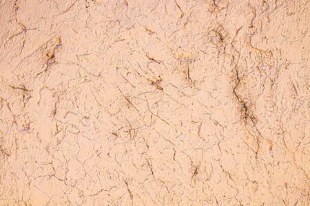 Painted clay wall as backgroundの写真素材