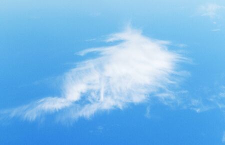 White clouds close-up on a blue skyの写真素材