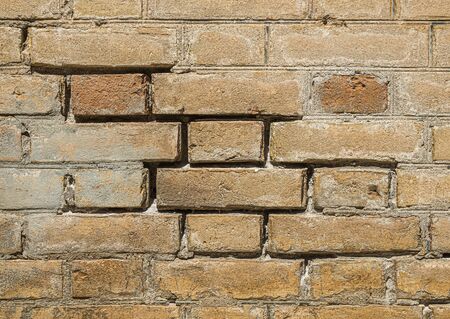Old brick wall as background close-upの写真素材