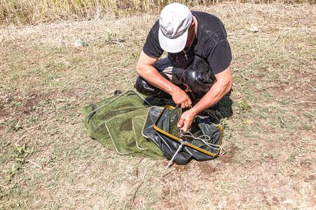 Cage for caught fish. Fishing equipmentの写真素材