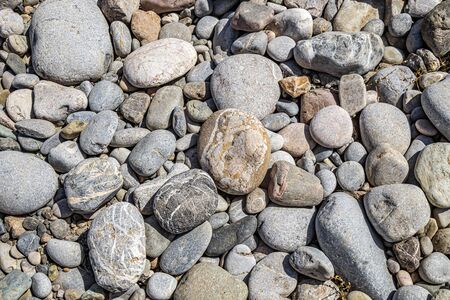 Natural pebble stone and cobblestone in nature close-upの写真素材