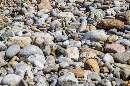 Natural pebble stone and cobblestone in nature close-upの写真素材