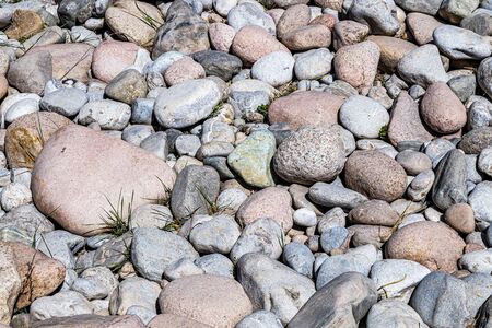 Natural pebble stone and cobblestone in nature close-upの写真素材