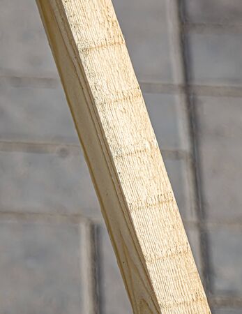 Lumber Wooden block on concrete backgroundの写真素材