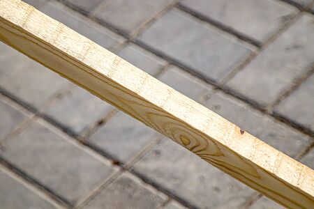 Lumber Wooden block on concrete backgroundの写真素材
