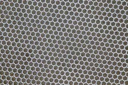 Gray metal mesh with cells as background