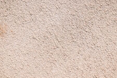 Old wall plastered with cement mortar as background for designの写真素材