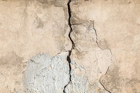 Old wall plastered with cement mortar as background for designの写真素材
