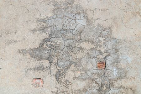 Old wall plastered with cement mortar as background for designの写真素材