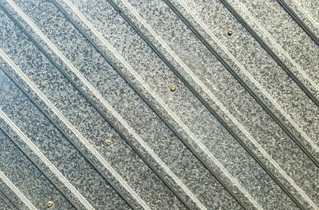 Galvanized profiled sheet wall as background for designの写真素材