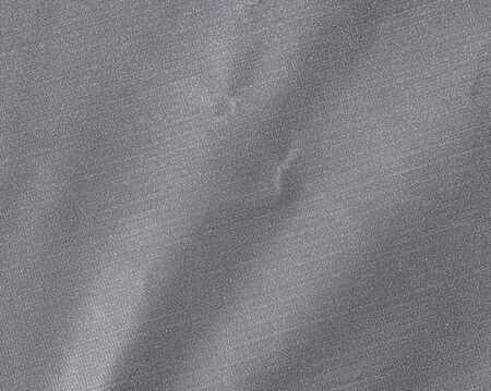 Wall of gray granular material as a backgroundの写真素材