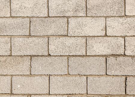 Brick cinder block wall as background for designの写真素材