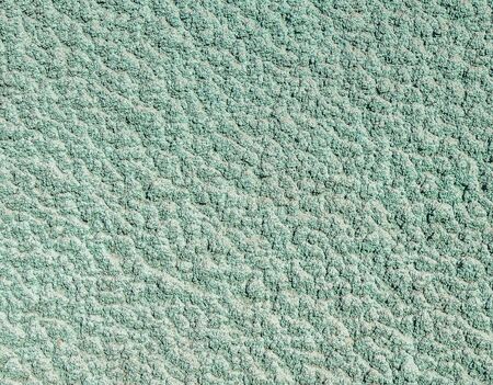 Wall plastered with cement mortar coat as a background for designの写真素材