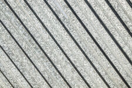 Galvanized profiled sheet wall as background for design
