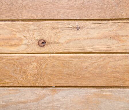Clapboard wooden boards as a background close-upの写真素材