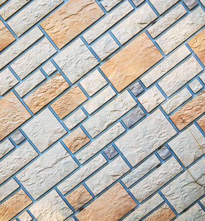 Artificial stone wall as background for designの写真素材