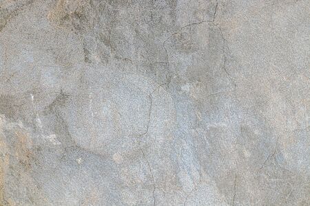 Old wall plastered with cement mortar as background for designの写真素材