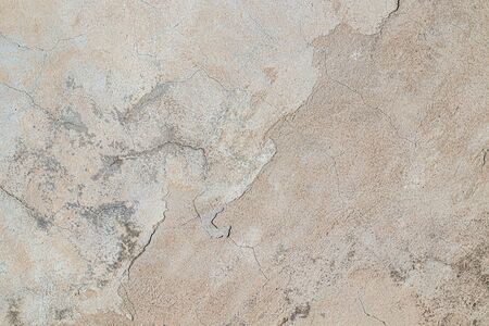 Old wall plastered with cement mortar as background for designの写真素材