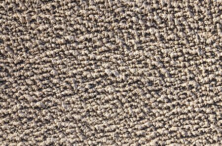 Wall plastered with cement mortar coat as a background for designの写真素材