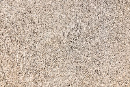 Old wall plastered with cement mortar as background for designの写真素材