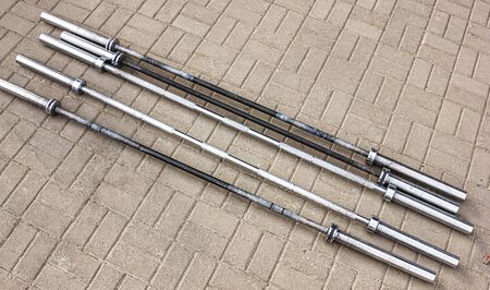 sports equipment barbell on the floor close-upの写真素材