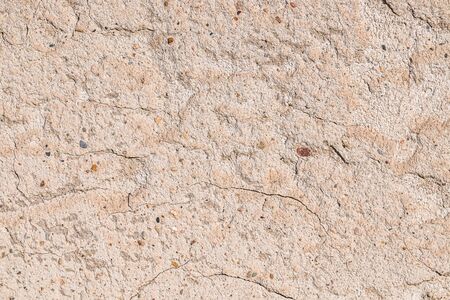 Old wall plastered with cement mortar as background for designの写真素材