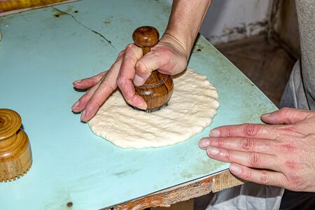 Making Asian flat bread loaf in unsanitary conditionsの写真素材