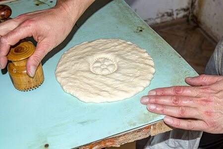 Making Asian flat bread loaf in unsanitary conditionsの写真素材