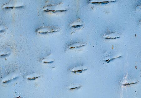 Old rusty painted metal surface as backgroundの写真素材