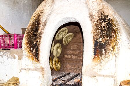 Making Asian flat bread loaf in unsanitary conditionsの写真素材