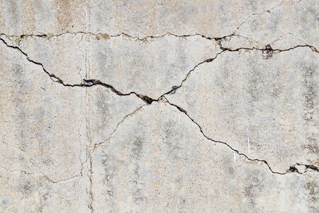 Cracked concrete wall as background.Selective focusの写真素材