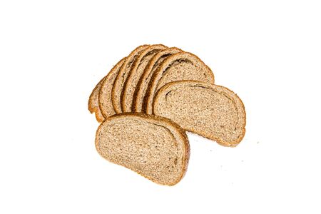 Sliced rye bread with crumbs on a white background. Selective focus.の写真素材