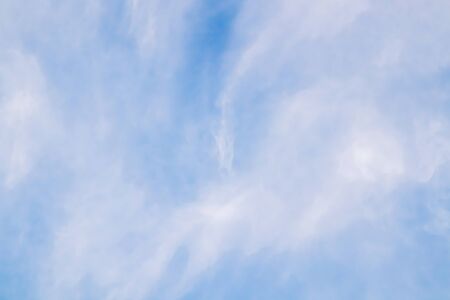 Blue sky with white clouds as a backgroundの写真素材