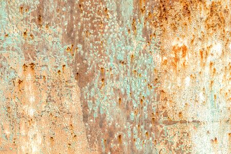 Old cracked paint on a metal surface as a backgroundの写真素材