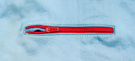 Zipper on the jacket pocket close-up