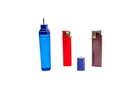 Gas lighter and spray can with gas for refueling lighters close-up on a white backgroundの写真素材