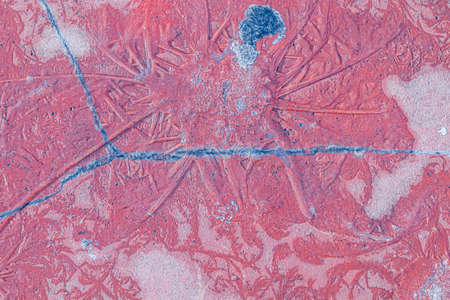 Frozen water on paving slabs as backgroundの写真素材