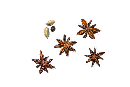 Star anise and cinnamon stick isolated on white background close-up. canella seasoning. background of fragrant seasoning. Flat lay, top view.の写真素材