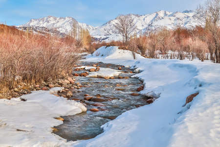 Winter mountain landscape in Kazakhstan.Snow on a mountain river.の写真素材