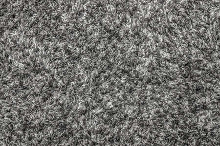 A gray long-pile carpet was carpeted as a background.の写真素材