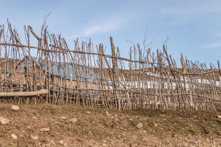 Fence from dry branches in Kazakhstanの写真素材