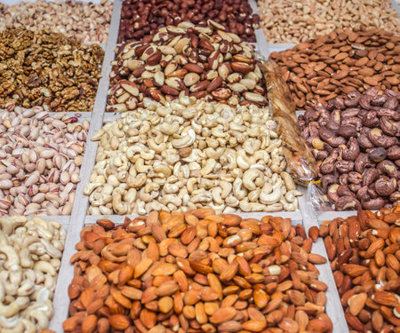 a bunch of different nuts in the oriental marketの写真素材
