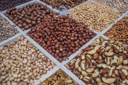 a bunch of different nuts in the oriental marketの写真素材