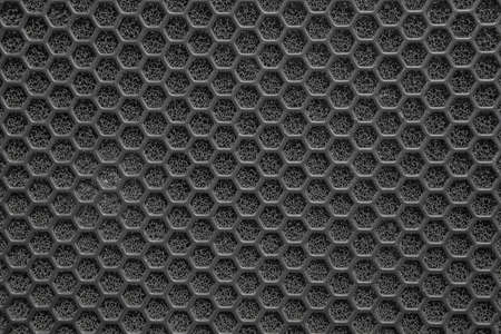 Black mesh metal structure as a backgroundの写真素材