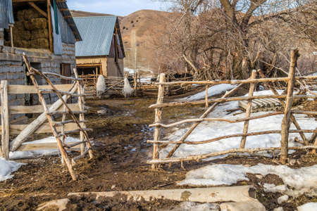 Fence from poles in Kazakhstan in the countrysideの写真素材