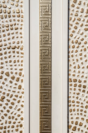 Forged and painted metal gate elements close-up as a background.の写真素材