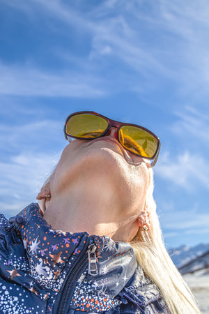 Girl looks at the skyの写真素材